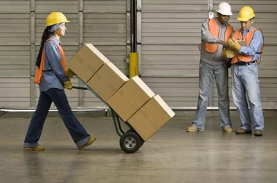 Id 6038 Hispanic Warehouse Worker Pushing Boxes On Hand Truck Bld057254