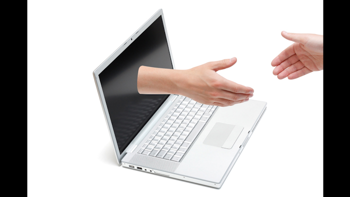 Id 18786 Shaking Hands Through Laptopa