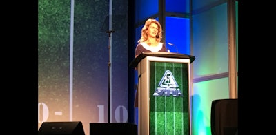 STAFDA executive director Georgia Foley discusses association figures and developments over the past year during the General Session. (ID photo)