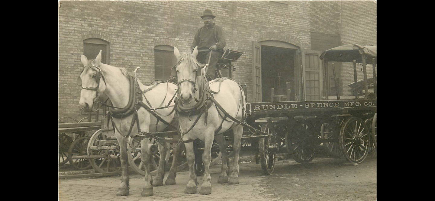 Most of Rundle-Spence's early deliveries were done via horse-and-buggy, like this one seen near the turn of the 20th century. (Rundle-Spence photo)