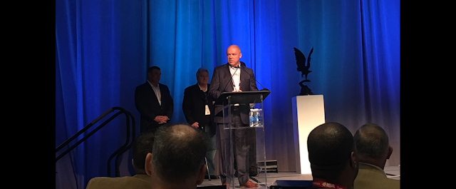 ISA President & CEO Ed Gerber addresses attendees of the ISA Convention Monday in Denver. (ID photo)