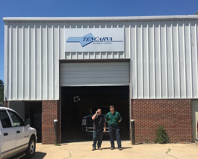 In front of the new Tencarva Columbus Branch office are Trent Unruh (left), service sales in Columbus, and Jason Rowland, Jackson, Miss., branch manager.