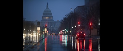 The U.S. Capitol is seen as rain falls on Pennsylvania Avenue in Washington. Why are Republicans struggling mightily to reach a consensus on how to overhaul the nation’s tax system? The GOP is supposed to be really good at cutting taxes. (AP Photo)