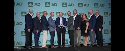 John Wiborg (center) and members of Stellar Industrial Supply accept AD Industrial's first ever Best Workplace Award at the AD Industrial North American meeting in Grapevine, TX. (AD photo)