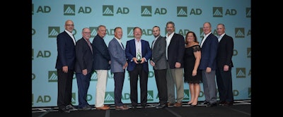 John Wiborg (center) and members of Stellar Industrial Supply accept AD Industrial's first ever Best Workplace Award at the AD Industrial North American meeting in Grapevine, TX. (AD photo)