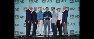 Members of S.L. Fusco accept AD Industrial's award for Tier 1 Member of the Year.