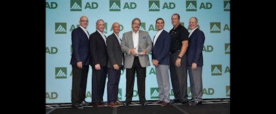 Members of All Integrated Solutions, Sia Abrasives and CribMaster accept AD Industrial's award for Best Conversion for MRO.