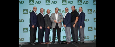 Members of All Integrated Solutions, Sia Abrasives and CribMaster accept AD Industrial's award for Best Conversion for MRO.
