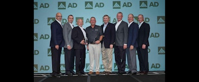Members of DormerPramet and Sterling Supply accept AD Industrial's award for Best Conversion for Metalworking.