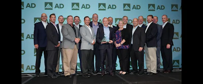 Members of Stanley Black & Decker and DeWalt Tool accept AD Industrial's Tier 2 Supplier of the Year award.