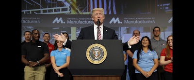 President Donald Trump speaks to the National Association of Manufactures at the Mandarin Oriental hotel, Friday in Washington. (AP Photo/Evan Vucci)