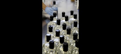 Steve Strong bottles vodka for sale at his S.D. Strong Distilling business in Parkville, Mo. (AP Photo)