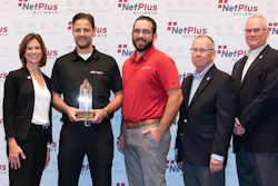 Members of Northern Safety & Industrial posing with NetPlus Alliance executives after accepting NetPlus' Distributor of the Year Award.
