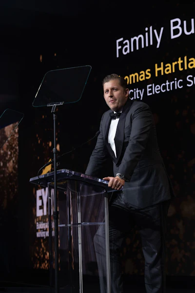 Thomas Heartland-Mackie accepting the Ernst & Young LLP (EY US) Entrepreneur Of the Year 2019 Award for Family Businesses at a black-tie ceremony held on Nov. 16 in Palm Springs, CA.