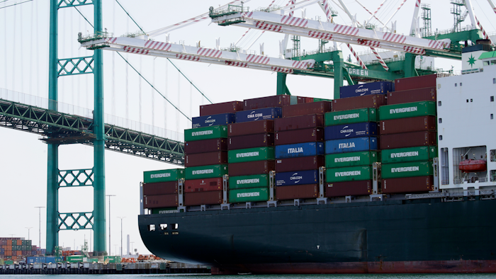 In this June 19, 2019 file photo, a cargo ship is docked at the Port of Los Angeles in Los Angeles.