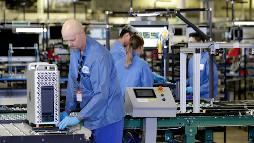 In this Nov. 20, 2019 file photo, workers assemble Apple products at an Apple manufacturing plant in Austin, TX.