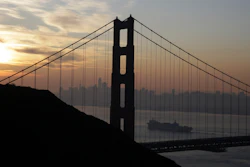 In this Oct. 28, 2019 file photo a Matson container ship passes the Golden Gate Bridge in Sausalito, CA.