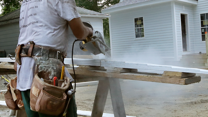 In this Oct. 2, 2019 file photo, a carpenter works on a construction site in North Andover, MA.