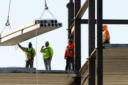 In this Dec. 3, 2019 file photo, workers erect a building under construction, in Philadelphia.
