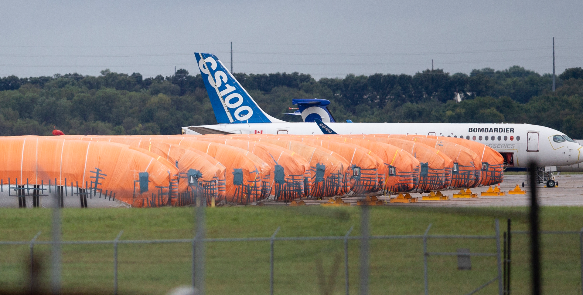 In this Oct. 3, 2019 file photo, completed Boeing 737 MAX fuselages, made at Spirit Aerosystems in Wichita, KS, sit covered in tarps near the factory.