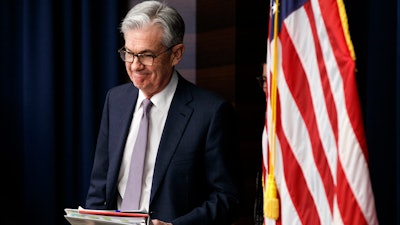 In this Dec. 11, 2019 file photo, Federal Reserve Chair Jerome Powell arrives to speak at a news conference after the Federal Open Market Committee meeting in Washington.