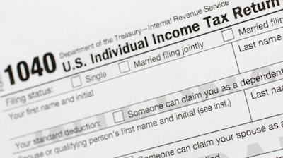 This July 24, 2018, file photo shows a portion of the 1040 U.S. Individual Income Tax Return form.