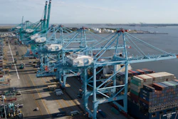 In this May 10, 2019 file photo, a container ship is unloaded at the Virginia International Gateway terminal in Norfolk, VA.