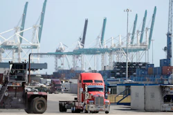 In this Feb. 14 photo, a truck leaves the docks at PortMiami in Miami.