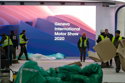 Workers dismantle a booth after that the 90th Geneva International Motor Show (GIMS) is cancelled by Swiss authorities, at the Palexpo in Geneva, Switzerland on Friday, Feb. 28. The 90th edition of the International Motor Show, scheduled to begin on March 5th, is cancelled due to the advancement of the (Covid-19) coronavirus in Switzerland. The Swiss confederation announced today that all events involving more than 1,000 people would be banned until 15 March.
