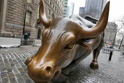 This Feb. 7, 2018 file photo shows the Charging Bull sculpture by Arturo Di Modica, in New York's Financial District. The longest bull market in U.S. history is over after nearly 11 years. The bull market officially ran from March 9, 2009, until Feb. 19, 2020, when it began the 20% dive that has taken it into bear market territory as of Thursday, March 12.