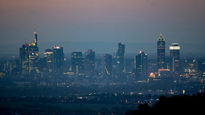 The buildings of the banking district are seen in Frankfurt, Germany, early Tuesday, April 14, 2020. Due to the coronavirus the economy expects worldwide heavy losses.