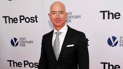 In this Dec. 14, 2017, file photo, Jeff Bezos attends the premiere of 'The Post' at The Newseum in Washington. United Nations experts on Wednesday, Jan. 22, 2020 have called for 'immediate investigation' by the United States into information they received that suggests that Jeff Bezos' phone was hacked after receiving a file sent from Saudi Crown Prince Mohammed bin Salman's WhatsApp account.