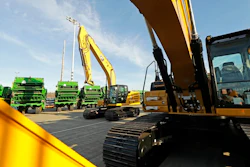 In this Nov. 4, 2019, file photo construction equipment made by Caterpillar are readied for export to Asia at the Port of Tacoma in Tacoma, Wash. Caterpillar Inc. reports financial results Friday, Jan. 31, 2020.
