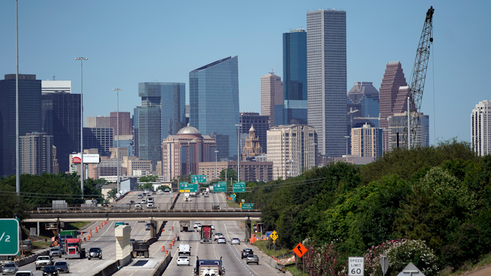Traffic moves along Interstate 10 near downtown Houston.