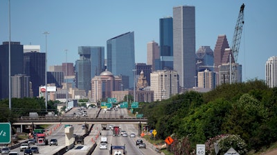 Traffic moves along Interstate 10 near downtown Houston.