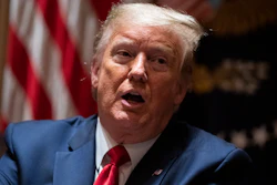 President Donald Trump speaks during a meeting with North Dakota Gov. Doug Burgum and Colorado Gov. Jared Polis on the coronavirus response, in the Cabinet Room of the White House on Wednesday, May 13.
