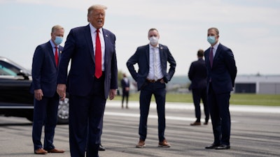 President Donald Trump speaks after exiting Air Force One at Lehigh Valley International Airport in Allentown, Pa.