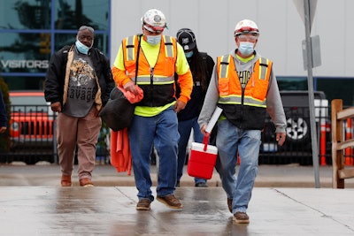 United Auto Workers members leave the Fiat Chrysler Automobiles Warren Truck Plant..