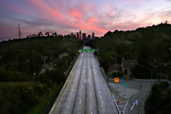 In this April 26, 2020 photo, empty lanes of the 110 Arroyo Seco Parkway that leads to downtown Los Angeles is seen during the coronavirus outbreak..