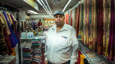 Chander Shekhar, co-owner of Shopno Fashion in New York's Jackson Heights neighborhood.