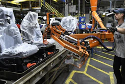 Workers assemble trucks at the Ford Kentucky Truck Plant in Louisville, Oct. 27, 2017.