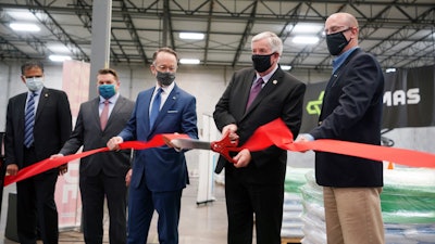 This photo from Optimas Solutions' ribbon-cutting ceremony for its new St. Louis distribution center shows, from left: Subash Alias, CEO, Missouri Partnership; Winston Calvert, St. Louis County Chief Strategy Officer; Steve Johnson, President and Chief Executive Officer, Alliance STL; Mike Parson, Governor, State of Missouri; Paul Przyby, VP, Sales and GM, Optimas.