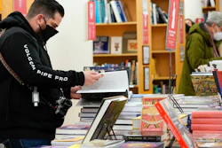 In this Nov. 28 photo, customers browse while shopping for books at the Strand Bookstore, an independent family-owned bookstore founded in 1927 in New York.