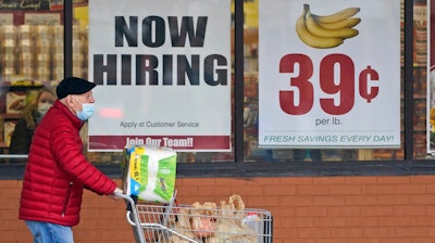 A man walks out of a Marc's store, Mayfield Heights, Ohio, Jan. 8, 2021.