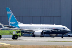 In this Monday, June 29, 2020, file photo, A Boeing 737 MAX jet taxis after landing at Boeing Field following a test flight in Seattle. Boeing will pay $2.5 billion to settle a criminal charge related to its troubled 737 Max jetliner. The Justice Department announced the settlement Thursday, Jan. 7, 2021 nearly two years after the second of two crashes that killed 346 people in all.