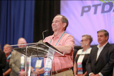 Andy Nations receiving the PTDA's Warren Pike Award for lifetime achievement.