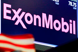 ExxonMobil logo above a trading post on the floor of the New York Stock Exchange, April 23, 2018.