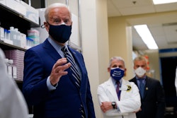 President Joe Biden speaks during a visit to the Viral Pathogenesis Laboratory at the National Institutes of Health.