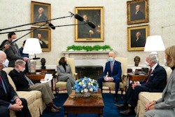 President Joe Biden speaks during a meeting with lawmakers on investments in infrastructure, in the Oval Office of the White House, Thursday, Feb. 11, 2021, in Washington. From left, Sen. Ben Cardin, D-Md., Sen. Jim Inhofe, R-Okla., Vice President Kamala Harris, Biden, Sen. Tom Carper, D-Del., and Sen. Shelley Moore Capito, R-W.Va.