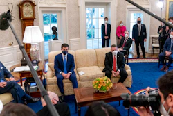 From left, President Joe Biden, Transportation Secretary Pete Buttigieg, House Transportation and Infrastructure Committee Ranking Member Rep. Sam Graves, R-Mo., Rep. Brian Fitzpatrick, R-Pa., Highways and Transit Subcommittee Ranking Member Rep. Rodney Davis, R-Ill., and other members of the House of Representatives meet in the Oval Office, March 4, 2021.